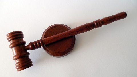 Gavel sitting on a coaster