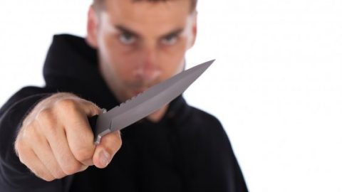 Threatening man with a knife