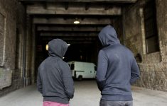 Teenage boys in hoodies