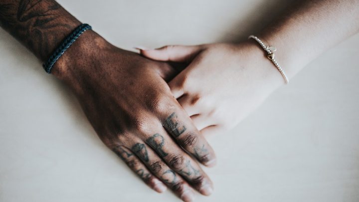 Hands embrace