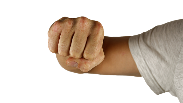 Punch thrown by male wearing white shirt