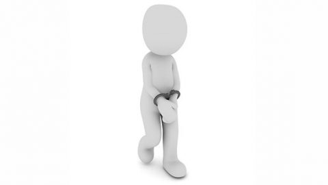 Figure under arrest