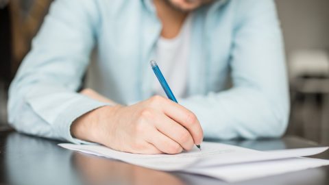 Man writing letter