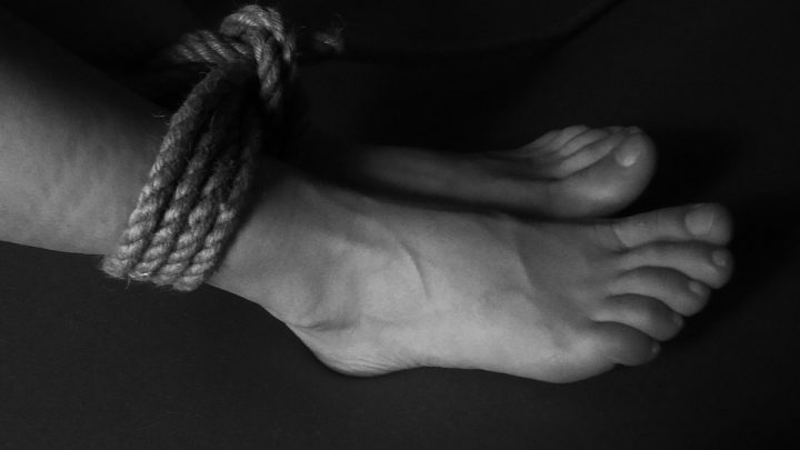 Feet tied with a rope