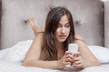 Girl sending nude selfies in bed