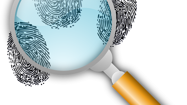 Magnify glass and a fingerprint