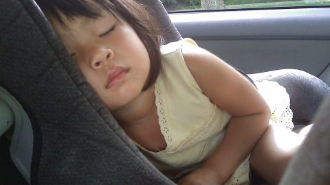 Sleeping child in car