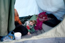 Detention centre tent with child