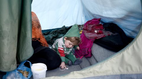 Detention centre tent with child