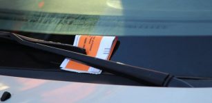 Parking fine on car windshield