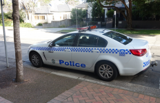 Police car parked on road