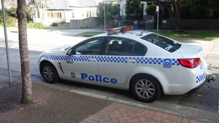 Police car parked on road