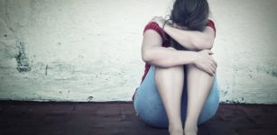Domestic violence victim woman crying
