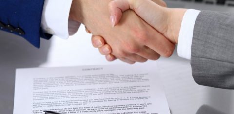 Business agreement handshake