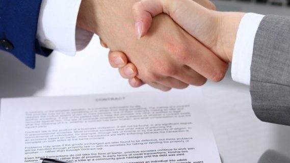 Business agreement handshake