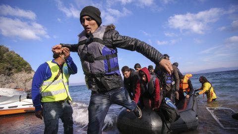 Refugees coming off boat