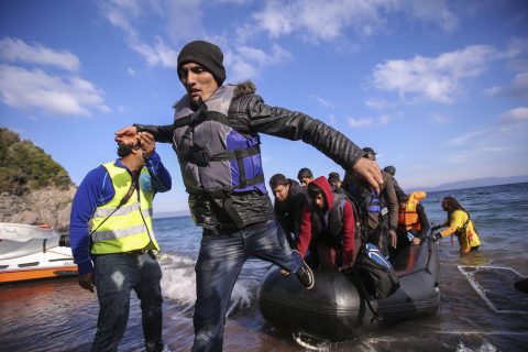 Refugees coming off boat
