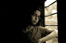 Boy looking out of window