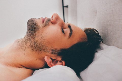 Sleeping man in bed