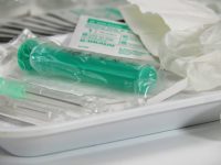 Syringe on tray