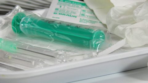 Syringe on tray