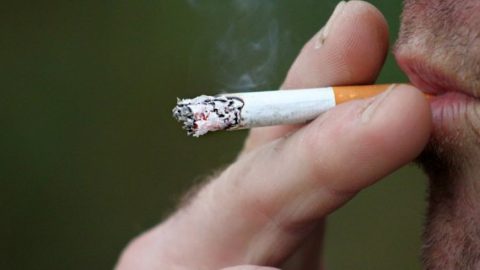 Smoking a cigarette