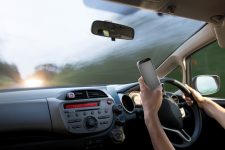 Texting with mobile phone while driving