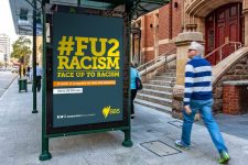 Face up to racism advert on bus stop