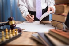 Lawyer wearing a tie and reading books