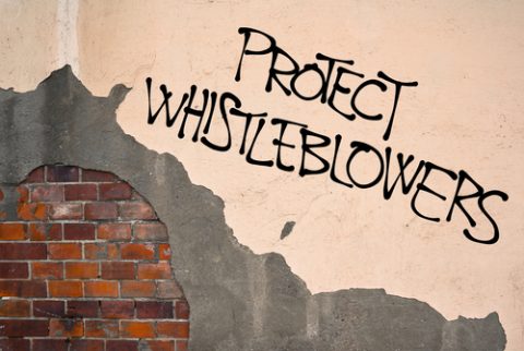 Protect whistleblowers written in graffiti
