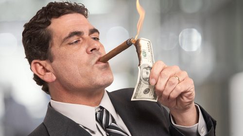Greedy boss smoking cigar