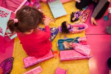 Young girl playing with toys