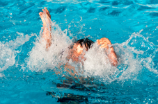 Boy drowning in a pool