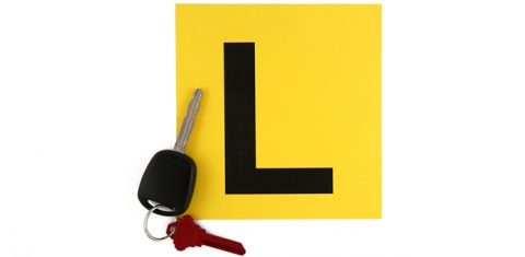 Learner driver l plate and car keys