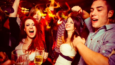 Drinking and dancing at the club