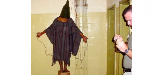 Tortured hooded man