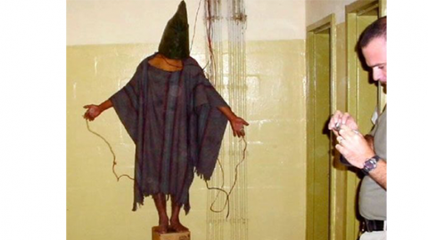 Tortured hooded man