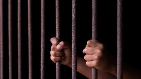 Youth held in prison
