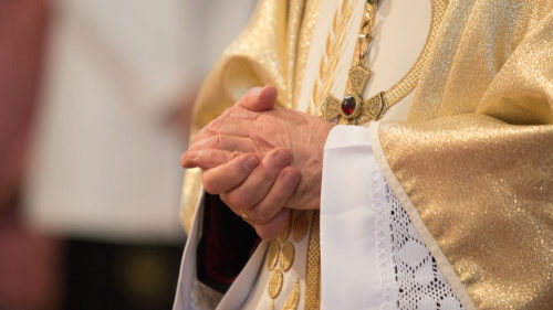 Priest hands