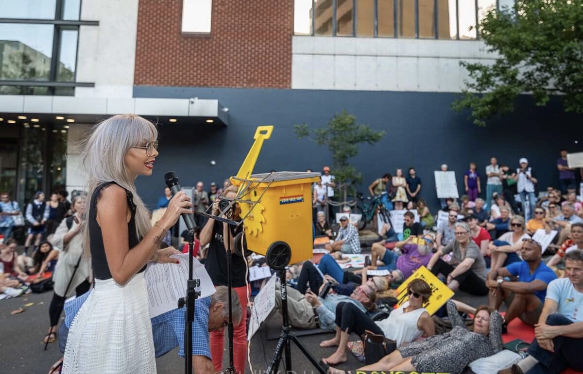 Larissa at a protest