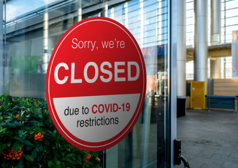 Closed COVID sign
