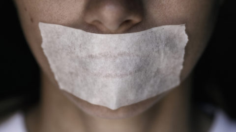 Mouth covered with tape