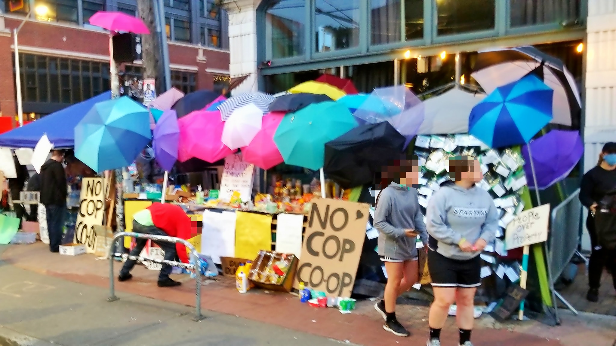 Autonomous Zone and umbrellas