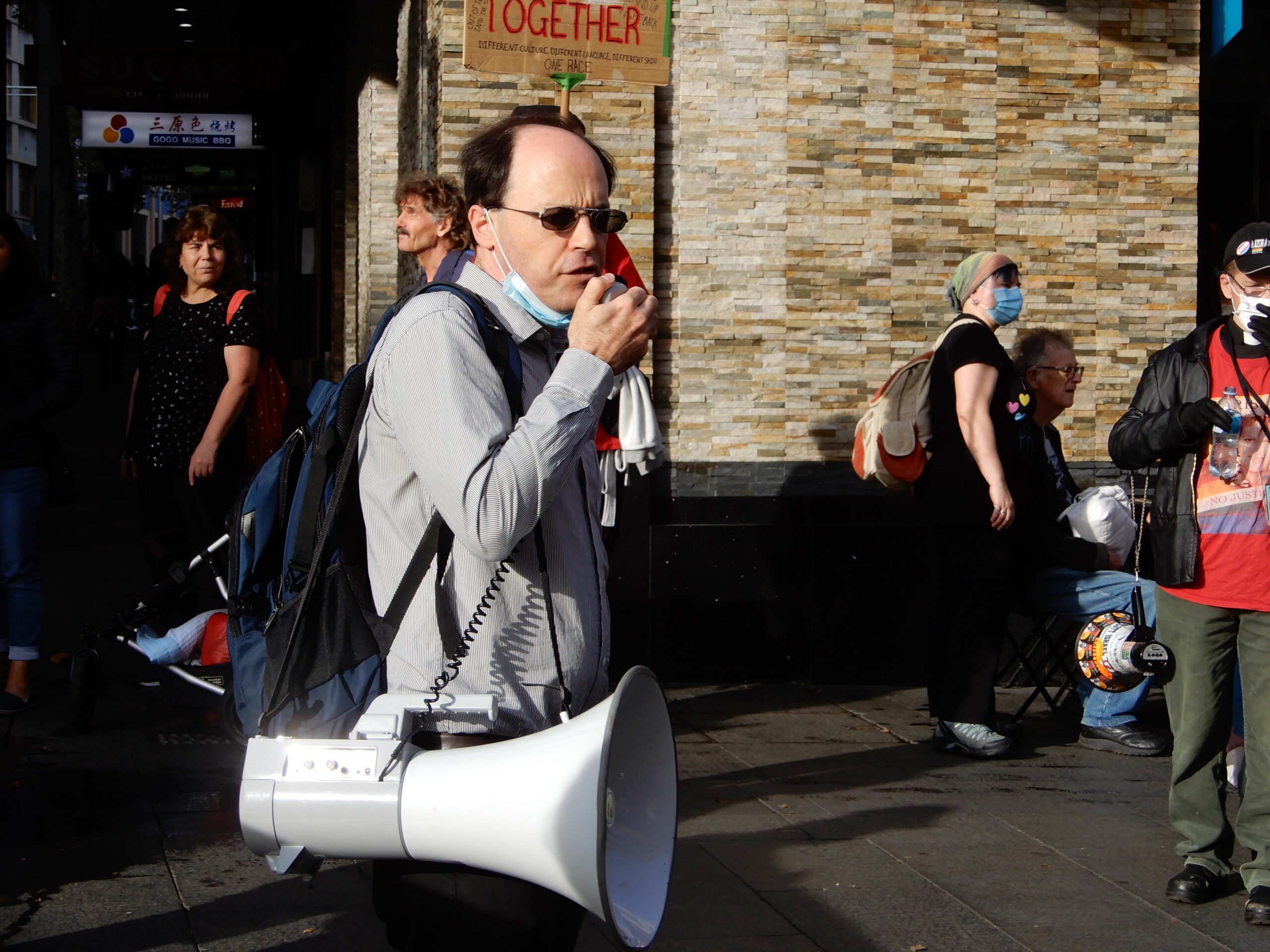 Dr Nicholas Riemer protesting recently in Chinatown