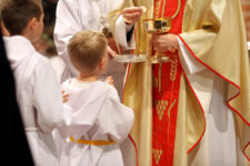 Priest and child