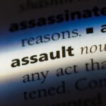 What are the criminal fines for assault charges in NSW?