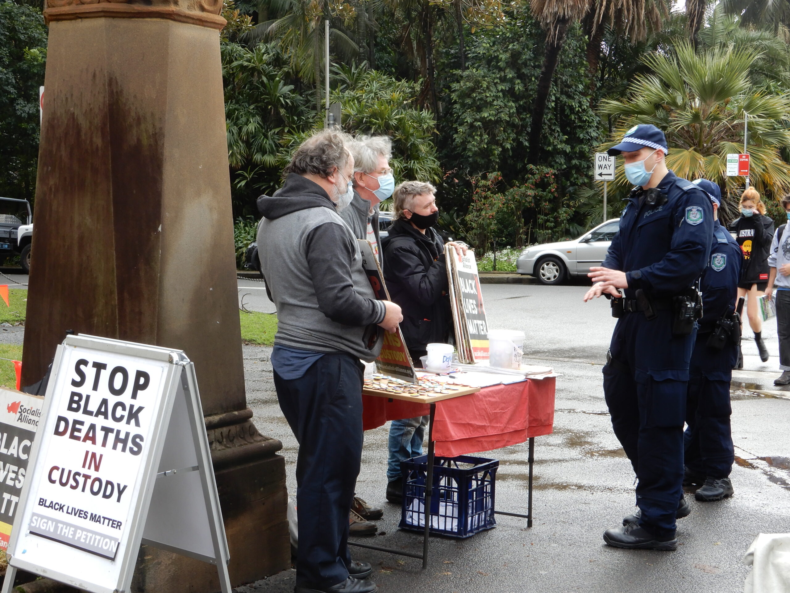 Officers tailing refugee march in Belmore Park on 13 June 2020