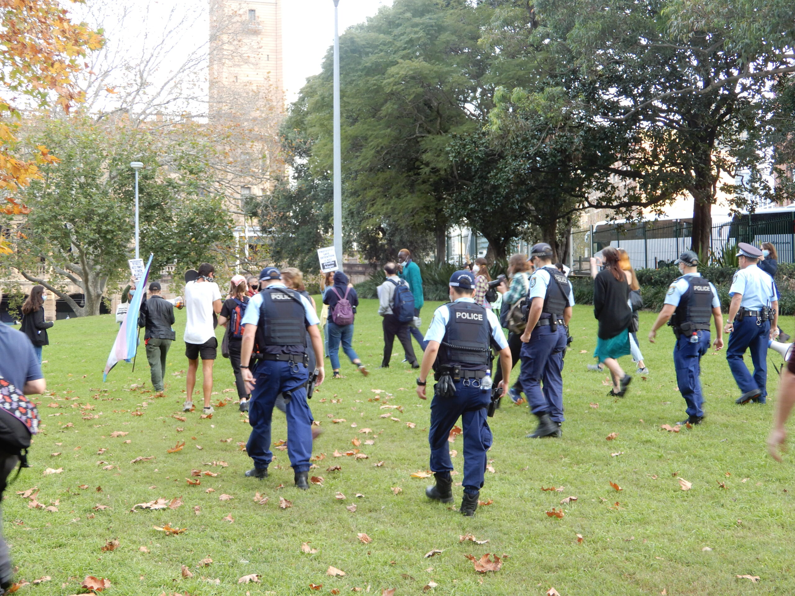 Officers tailing refugee march in Belmore Park on 13 June 2020