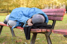 Homeless woman on bench