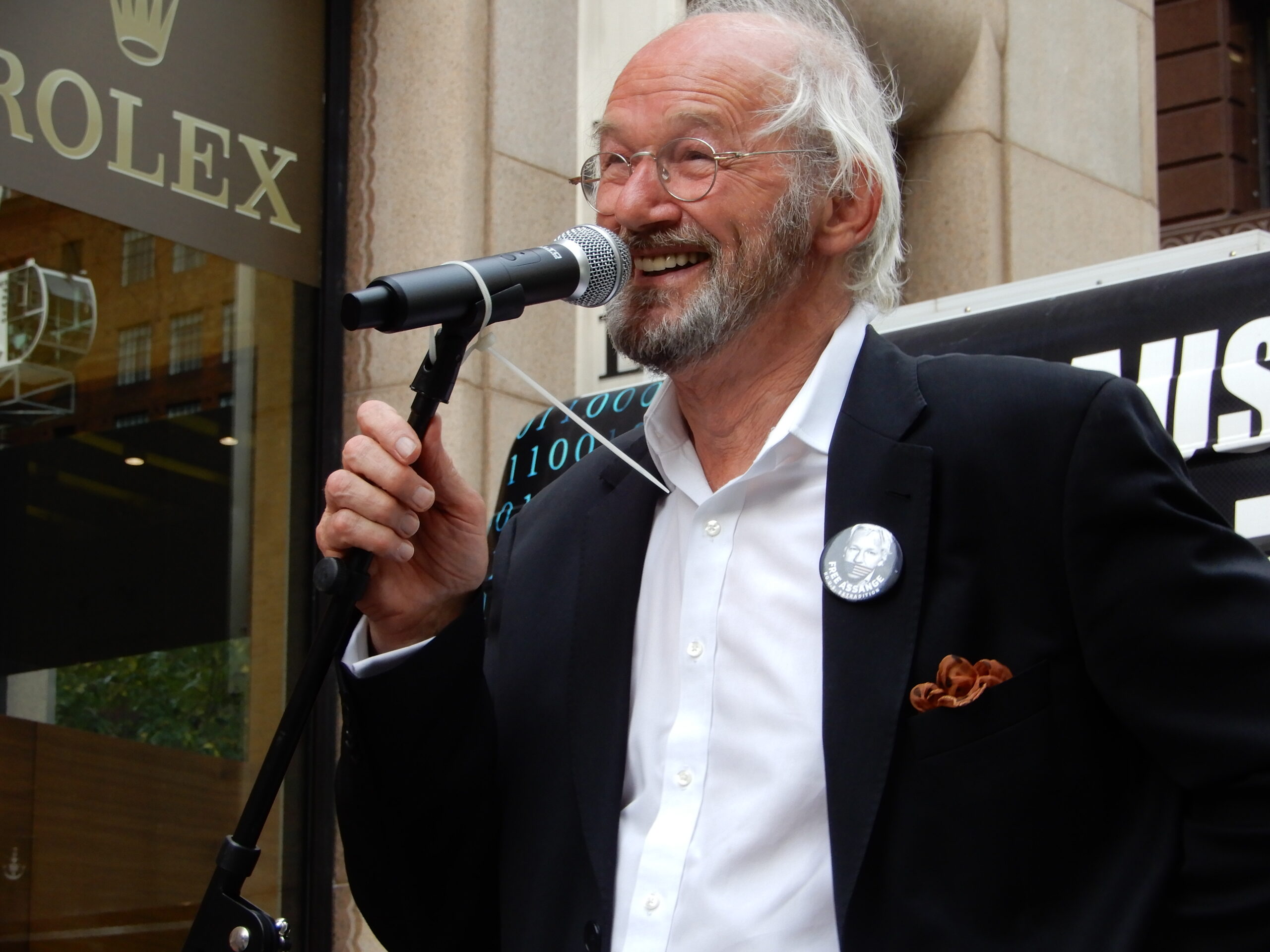 John Shipton addresses the rally